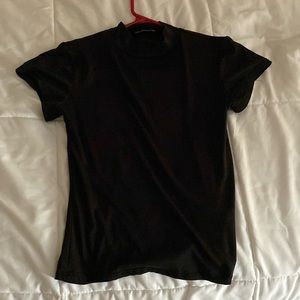 Croped black turtle neck t shirt very stretchy and in good condition